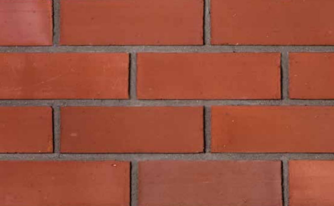 Close view of clay nature cladding brick texture and earthy colour variation