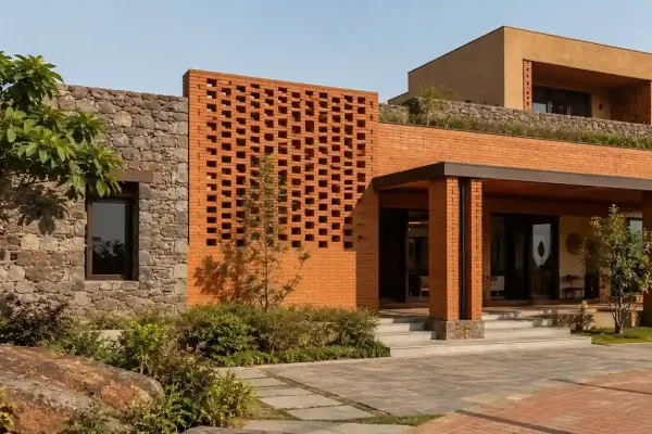 Modern villa comparing cladding bricks and natural stone exterior facade materials
